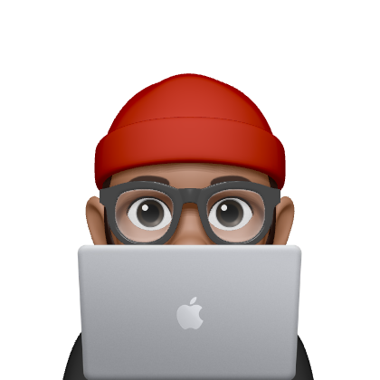 An emoji of Dennis "Mars" Porter on a Macbook, wearing a red hat.